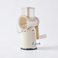 StormSlicer 5-in-1 rotary vegetable grater and slicer on a kitchen counter